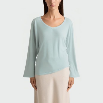 Asymmetrical solid color women's long-sleeved top